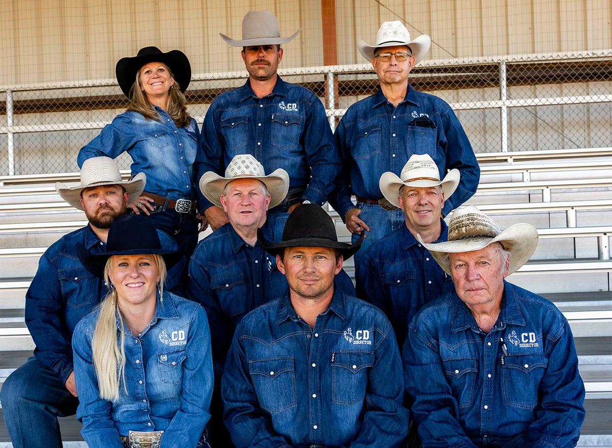 The 2026 Cattlemen's Days Executive Committee wearing denim shirts and cowboy hats.