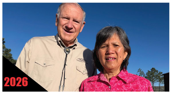 Parade Marshal Rick Barton and his wife, Melva, on a sunny day.